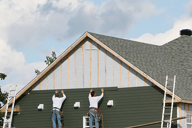 Professional Siding Replacement technician working in Manitou Springs, CO
